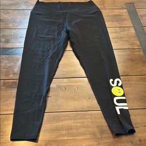 SoulCycle Black Leggings with Yellow Smiley Logo